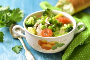 Summer soup with chicken and vegetables.